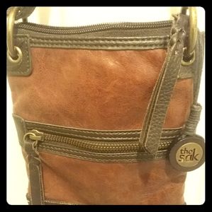 The Sak leather crossbody brown and black trim